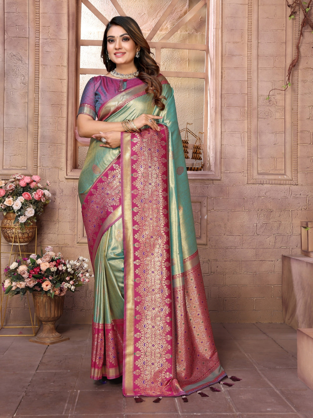 Pure kanchipuram banarasi tissue silk saree with zari weaving work.