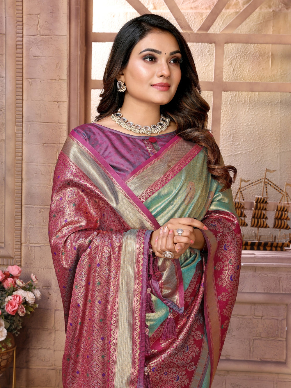 Pure kanchipuram banarasi tissue silk saree with zari weaving work.