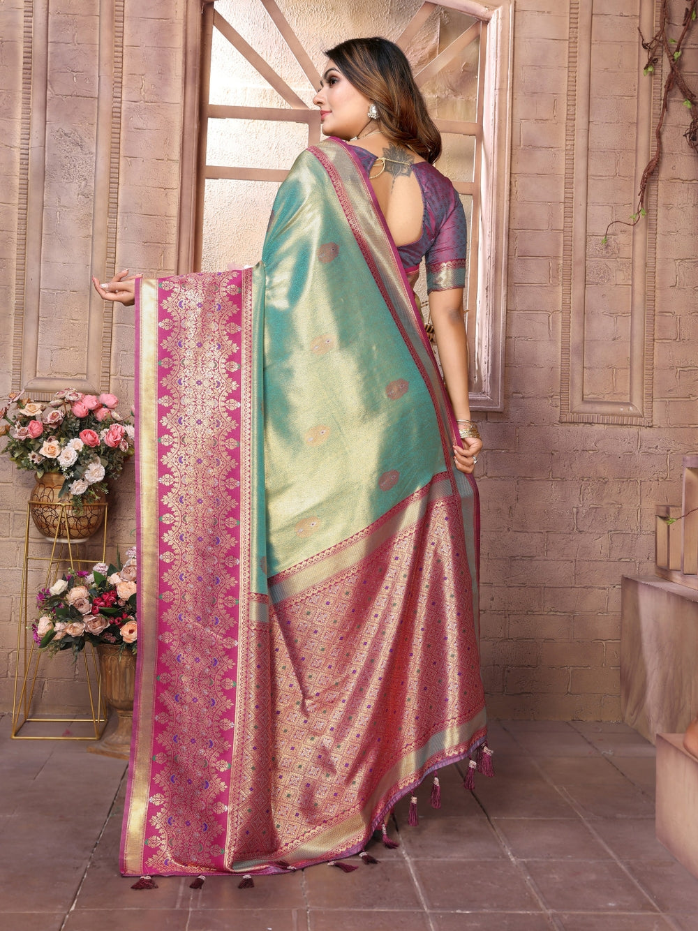 Pure kanchipuram banarasi tissue silk saree with zari weaving work.