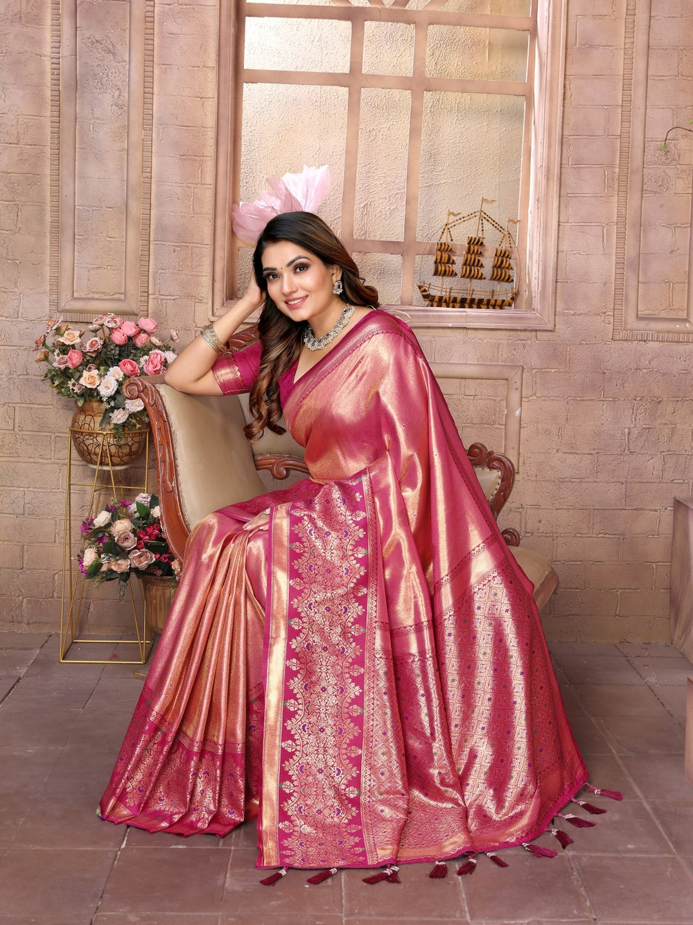 Pure kanchipuram banarasi tissue silk saree with zari weaving work.