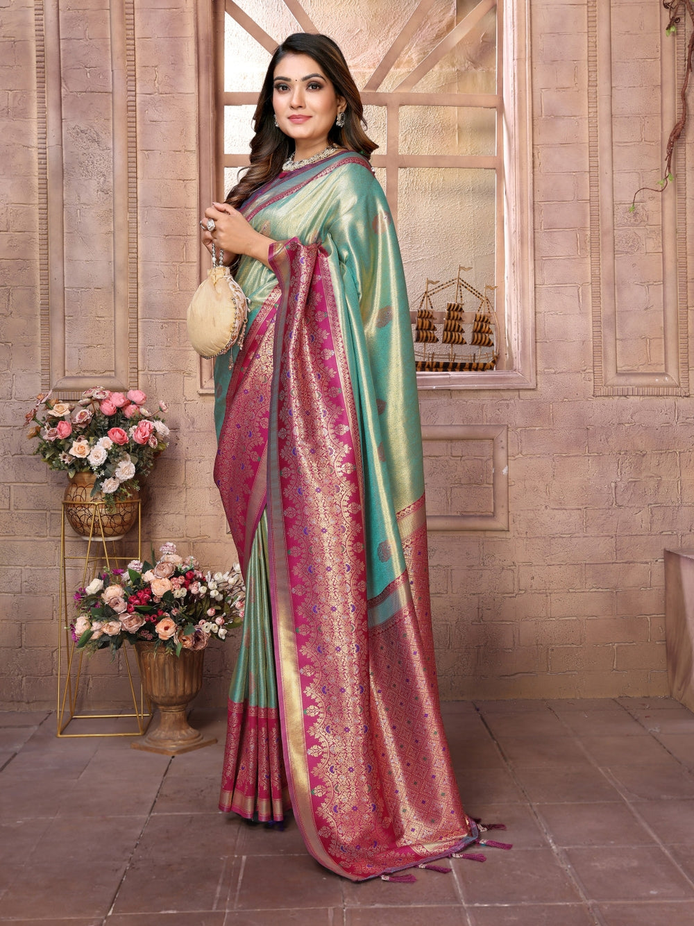 Pure kanchipuram banarasi tissue silk saree with zari weaving work.