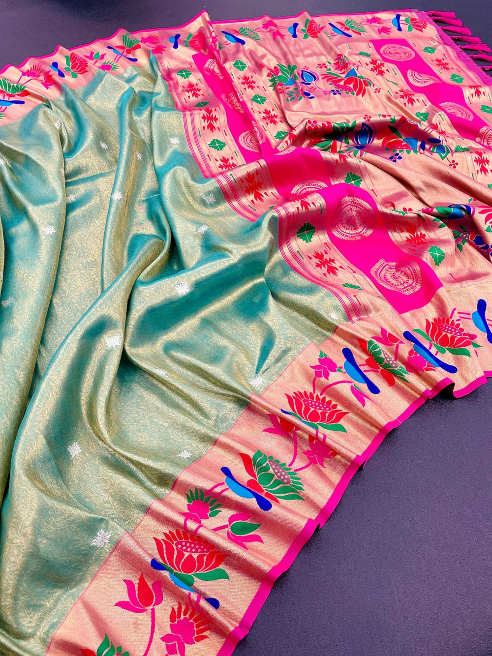 Soft tissue paithani silk saree with zari weaving work.