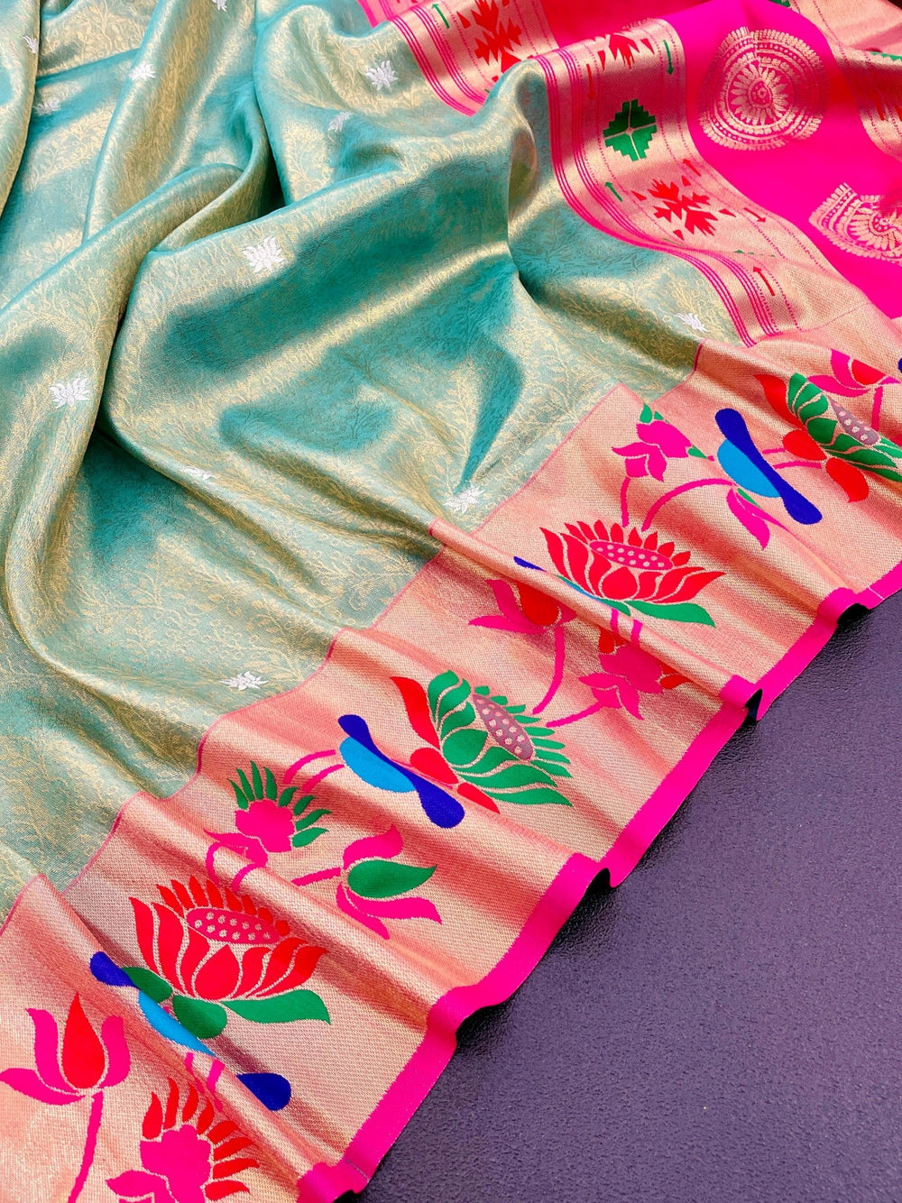 Soft tissue paithani silk saree with zari weaving work.