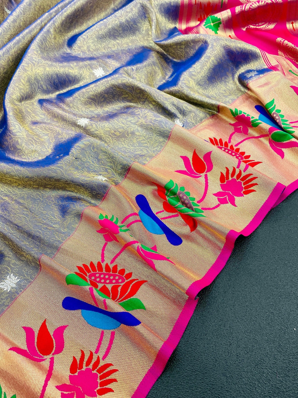 Soft tissue paithani silk saree with zari weaving work.
