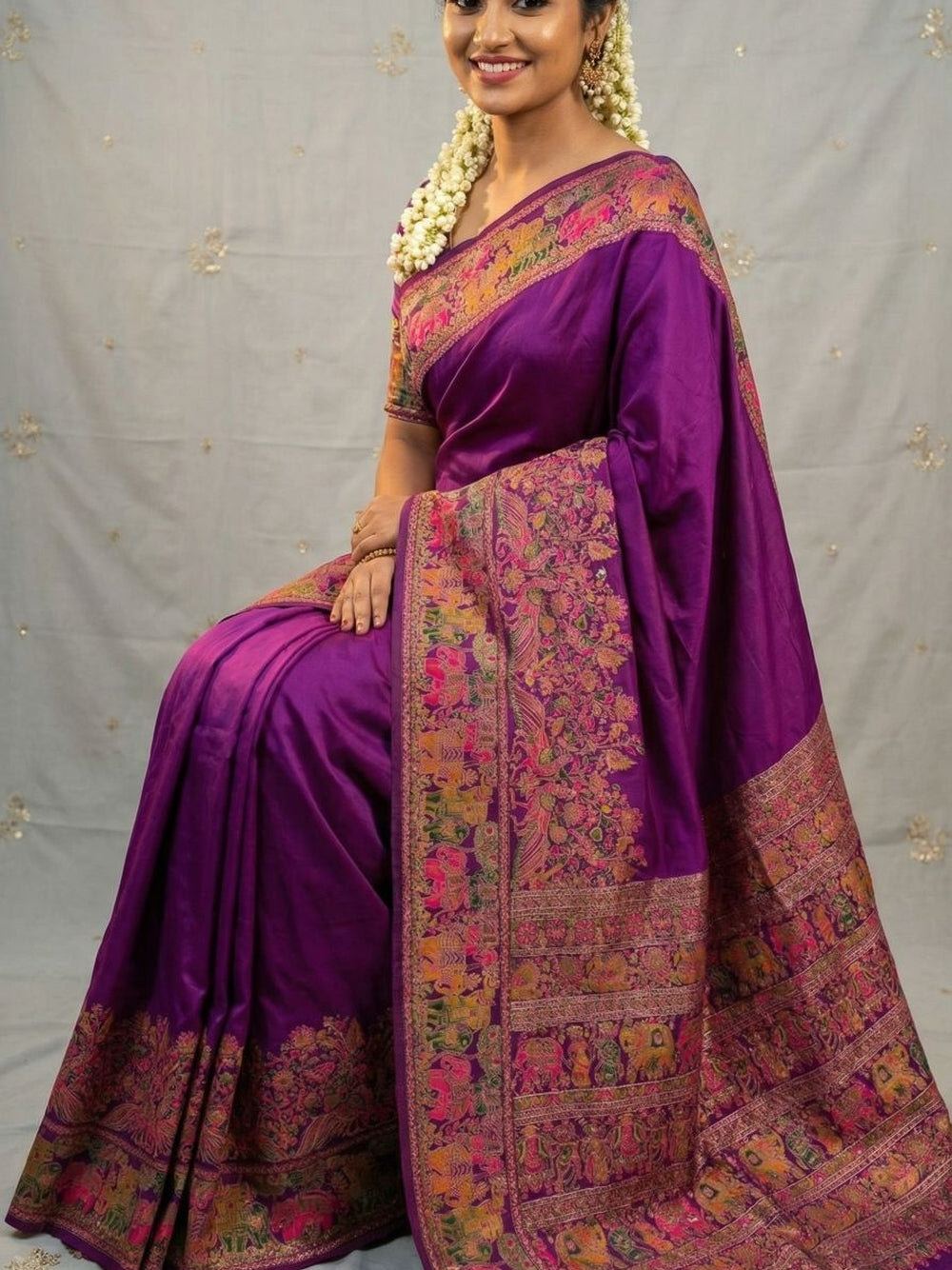 Traditional viscose pashmina silk saree with woven design.
