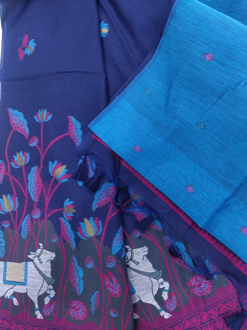 Navy blue premium muga cotton saree with pichwai & floral weaving work.