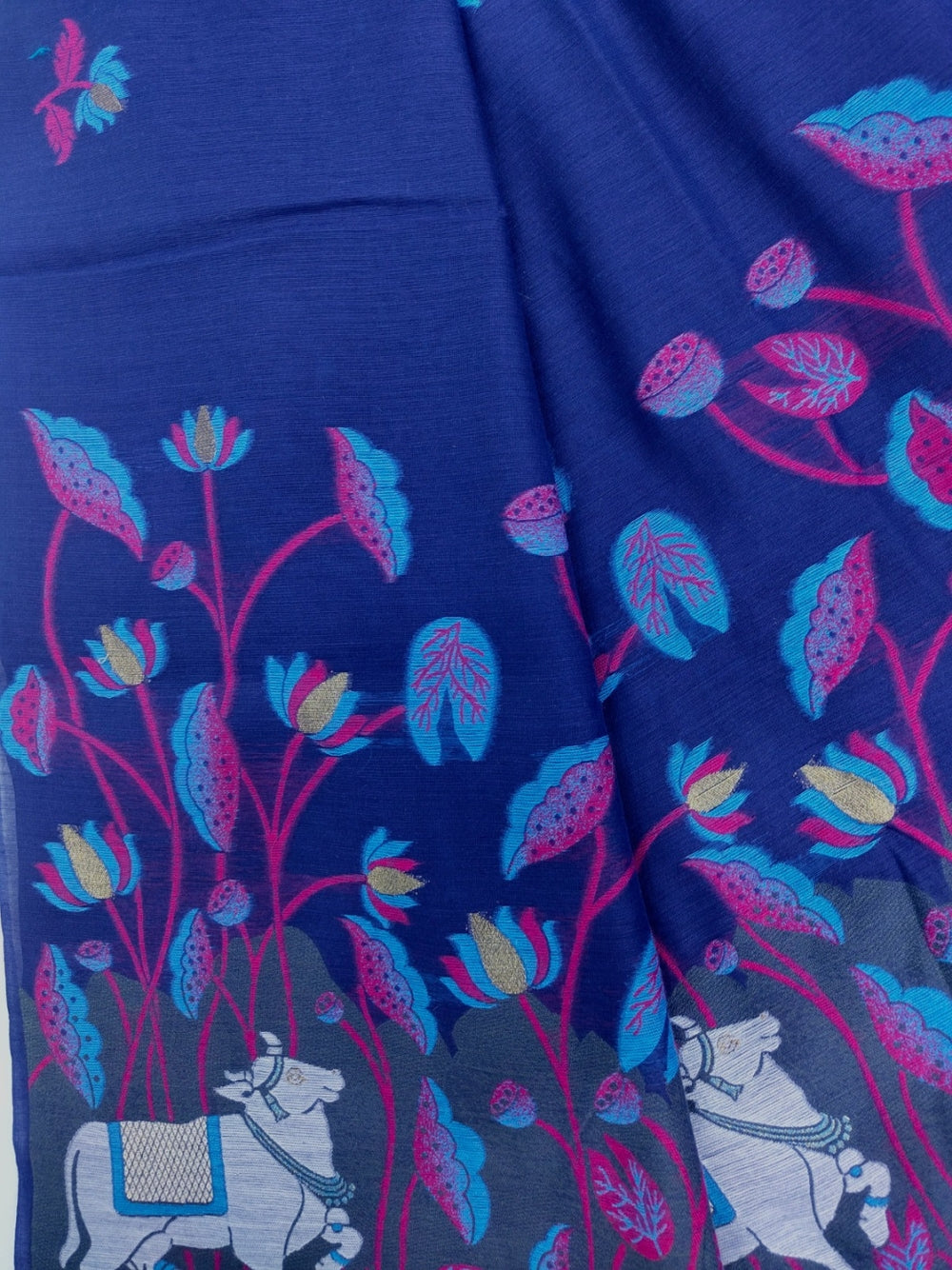 Navy blue premium muga cotton saree with pichwai & floral weaving work.