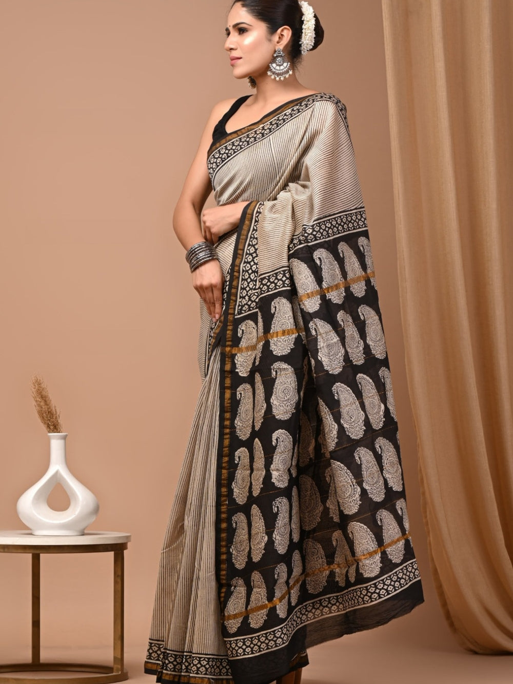 Pure chanderi silk saree with bagru handblock printed work.