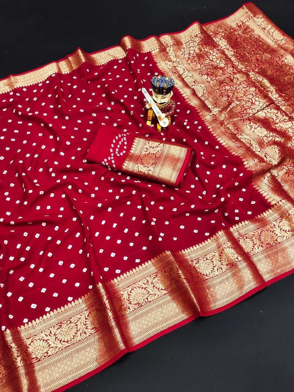 Pure hand bhandhej bandhani saree with kanchi zari weaving border & pallu.