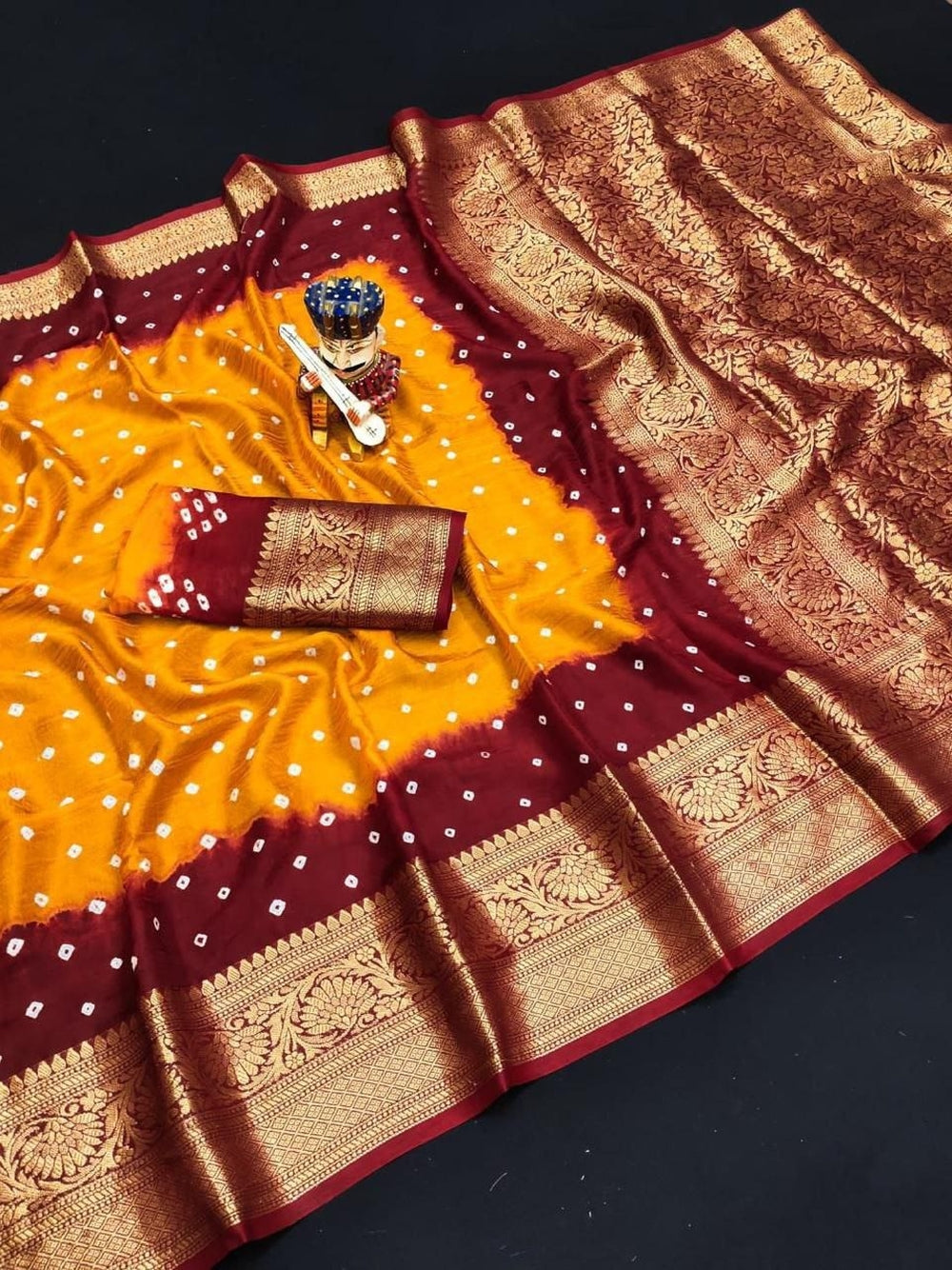 Pure hand bhandhej bandhani saree with kanchi zari weaving border & pallu.