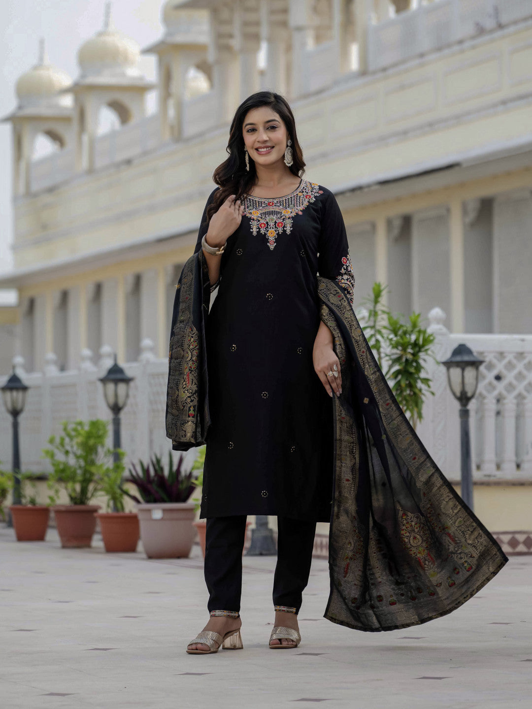 Black soft roman silk kurta and pant set with muslin silk meena work dupatta.