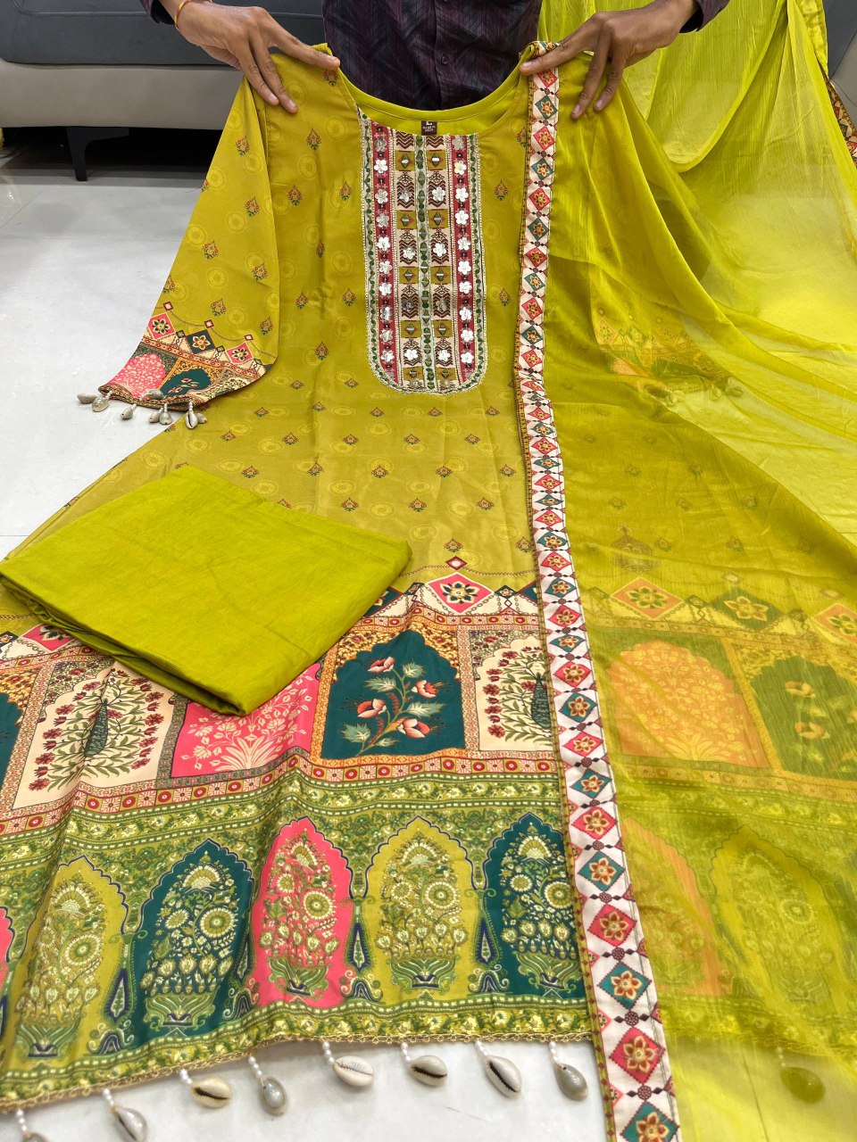 Mehndi green chinon silk kurta palazzo and dupatta set with printed and kodi work.